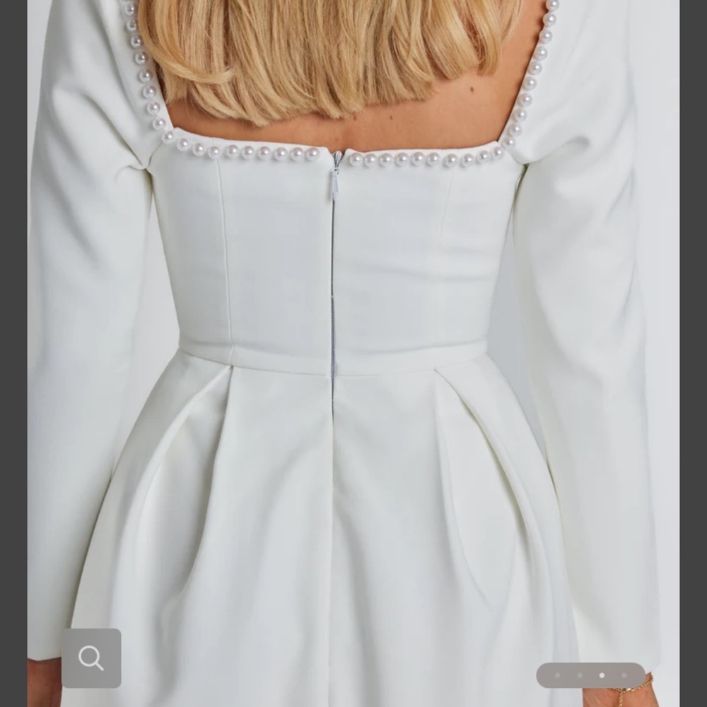 Elegant White Mini Dress with Pearl Detailing